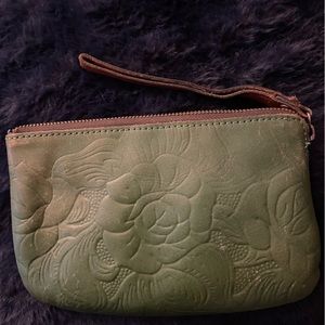 Patricia Nash green leather wristlet.